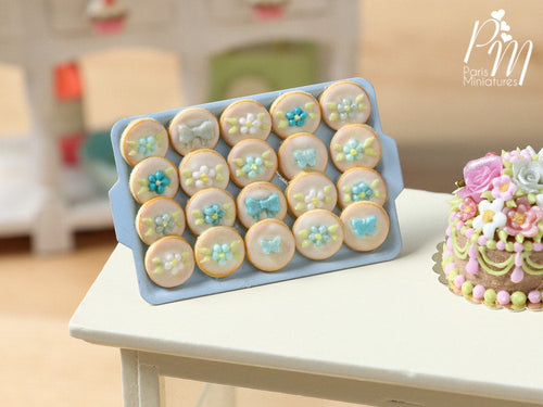 Presentation of Turquoise Decorated Cookies on Light Blue Baking Tray - Miniature Food