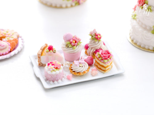 Beautiful presentation of pink pastries and treats (cheesecake slice, St Honoré...) - Miniature Food