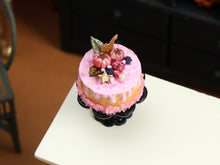 Load image into Gallery viewer, Pink Halloween Drip Cake Miniature with Tiny Caramel Squirrel, Pink Pumpkins &amp; Blackberries on Black Stand – 1:12 Dollhouse Handmade Food