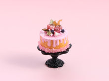 Load image into Gallery viewer, Pink Halloween Drip Cake Miniature with Tiny Caramel Squirrel, Pink Pumpkins &amp; Blackberries on Black Stand – 1:12 Dollhouse Handmade Food