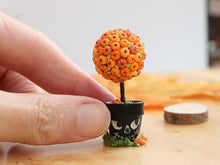 Load image into Gallery viewer, Pumpkin Topiary in Painted Skull Pot – Halloween Miniature Decor – OOAK 1:12 Scale