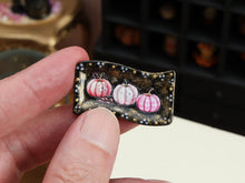 Load image into Gallery viewer, Pink Halloween Pumpkin Tray Miniature – Black &amp; Gold Wavy Platter with Three Pink Pumpkins – 1:12 Dollhouse OOAK Handmade Decor