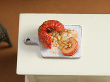 Load image into Gallery viewer, Cut-Open Pumpkin with Seeds on Rustic Chopping Board, 1:12 Dollhouse Miniature Food, OOAK