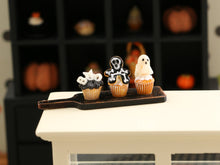 Load image into Gallery viewer, Three Spooky Halloween Cupcakes on Board (Glowing)- Handmade Miniature Food for 12th Scale Dollhouse