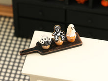 Load image into Gallery viewer, Three Spooky Halloween Cupcakes on Board (Glowing)- Handmade Miniature Food for 12th Scale Dollhouse