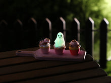 Load image into Gallery viewer, Three Pink Halloween Cupcakes (Glowing Ghost) on Pink Board - Handmade Miniature Food for 12th Scale Dollhous