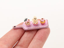 Load image into Gallery viewer, Three Pink Halloween Cupcakes (Glowing Ghost) on Pink Board - Handmade Miniature Food for 12th Scale Dollhous