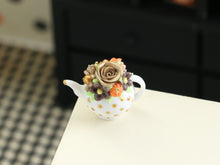 Load image into Gallery viewer, Teapot-shaped cake with floral design on a white surface