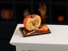 Load image into Gallery viewer, Hollowing Out Pumpkin with Slice - 12th Scale Handmade Dollhouse Miniature