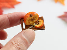 Load image into Gallery viewer, Hollowing Out Pumpkin with Slice - 12th Scale Handmade Dollhouse Miniature