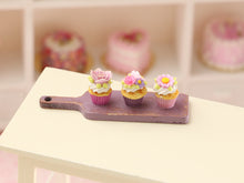 Load image into Gallery viewer, Three Elegant Floral Cupcakes Presented on Lilac Wooden Board - Handmade Miniature Dollhouse Food