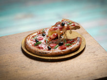 Load image into Gallery viewer, Miniature Pizza with Slice in a 'Frozen Moment' - Handmade Dollhouse Food in 12th Scale