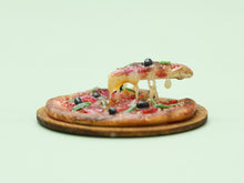 Load image into Gallery viewer, Miniature Pizza with Slice in a 'Frozen Moment' - Handmade Dollhouse Food in 12th Scale