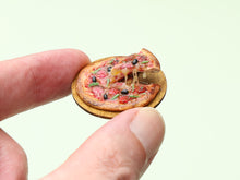 Load image into Gallery viewer, Miniature Pizza with Slice in a 'Frozen Moment' - Handmade Dollhouse Food in 12th Scale