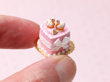 Load image into Gallery viewer, Handmade Miniature Dollhouse Cake with Elegant Pastry Swans – Pink Wedding &amp; Celebration Decor