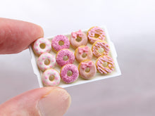 Load image into Gallery viewer, Tray of Decorated Pink Miniature Donuts on White Tray - Handmade Miniature Food