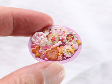 Load image into Gallery viewer, Assortment of Pink-Themed Miniature Cookies and Treats on Oval Tray