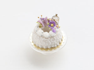 Savarin with purple floral decoration Miniature Food Dessert with swirls and golden birdcage - OOAK