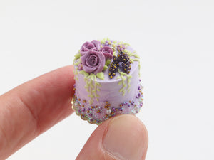 Tall lilac cake decorated with roses, black currant vines - handmade miniature food