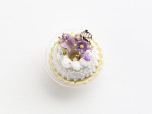 Savarin with purple floral decoration Miniature Food Dessert with swirls and golden birdcage - OOAK