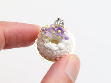 Load image into Gallery viewer, Savarin with purple floral decoration Miniature Food Dessert with swirls and golden birdcage - OOAK