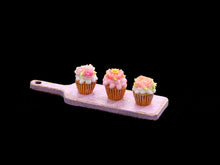 Load image into Gallery viewer, Three Pink Floral Cupcakes Presented on Pink Wooden Board - Handmade Miniature Dollhouse Food