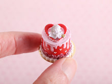 Load image into Gallery viewer, Romantic Tall Drip Cake With Cupid and Heart Decoration - 1:12 Scale Handmade Miniature Food