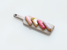 Load image into Gallery viewer, French Eclairs Presented on Wooden Board (Rose) - Handmade Miniature Dollhouse Food
