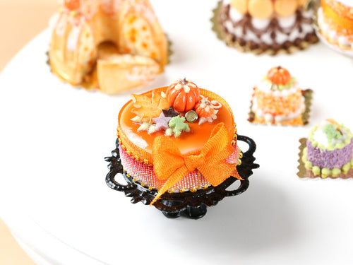 Halloween Cake on Black Metal Stand - Autumn Leaf Cookies, Pumpkin, Frog, Orange Bow