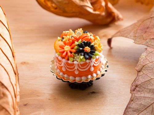 Orange Autumn Cake Decorated with Pumpkins, Marguerite Flowers, Apple Cookies and Caramels