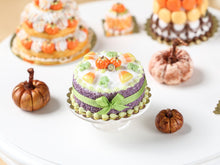 Load image into Gallery viewer, Halloween Miniature Cake - Pumpkins, Candy Corn, Frog Candies, Green Bow