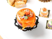Load image into Gallery viewer, Halloween Cake on Black Metal Stand - Autumn Leaf Cookies, Pumpkin, Frog, Orange Bow