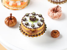 Load image into Gallery viewer, Halloween Cake with Dark Chocolate Pumpkins, Chocolate Coloured Bow - 12th Scale Miniature Food