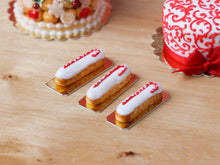 Load image into Gallery viewer, Candy Cane Decorated French Eclairs for Christmas - Miniature Food