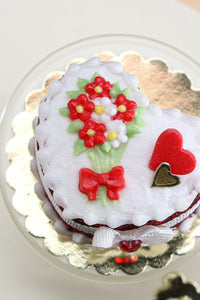 Handmade miniature heart-shaped Valentines Day cake in red by Paris Miniatures