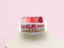 Load image into Gallery viewer, Rectangular Cake Decorated with Shades of Pink Pink Gummy Bears - Miniature Food