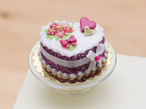 Handmade miniature heart-shaped Valentines Day cake in pink by Paris Miniatures