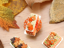 Load image into Gallery viewer, Rectangular Miniature Autumn Cake, Orange and White Chocolate Flowers - 12th Scale Dollhouse Food