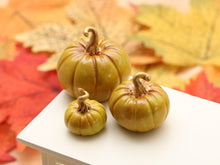 Load image into Gallery viewer, Set of Three Decorative Pumpkins - Wasabi Green with Gold Stalks - Autumn Handmade Dollhouse Miniature