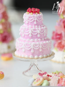 Three-tiered Pink Cake with Hand-Piped Icing with a Crown of Raspberries - Miniature Food