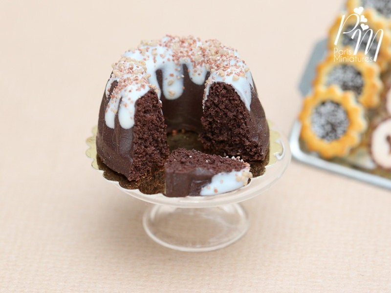Chocolate Kouglof Pound Cake with Drizzled Frosting and Cut Slice
