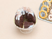 Load image into Gallery viewer, Chocolate Kouglof Pound Cake with Drizzled Frosting and Cut Slice