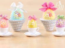 Load image into Gallery viewer, Candy Easter Egg Decorated with Blossoms in Egg Cup - Yellow Egg