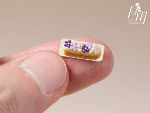 French Eclair Decorated with Purple and Lilac Blossoms - Miniature Food for Dollhouse 12th scale