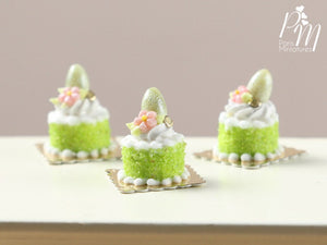 Spring Green Genoise Easter Individual Pastry Decorated with Candy Egg and Blossom