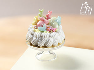 Easter Cream Cake Decorated with Colourful Candy Rabbits
