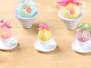 Candy Easter Egg Decorated with Blossoms in Egg Cup - Yellow Egg